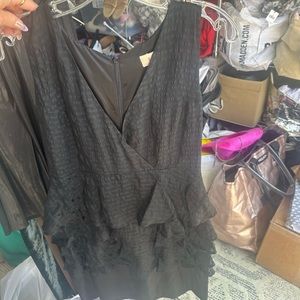 Black knee length ruffle dress